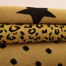 Lade das Bild in den Galerie-Viewer, Stenzo Leoparden Muster Feinstrick in senfgelb/schwarz
